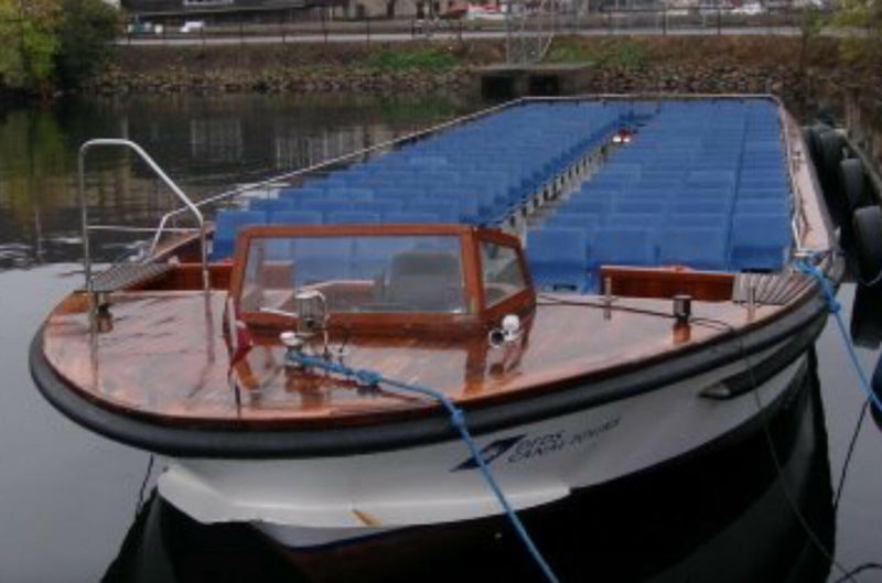 Dronning Tyra seilte kanalene i København før hun ble ombygd. Foto: Dronning Tyras Båtforening. 